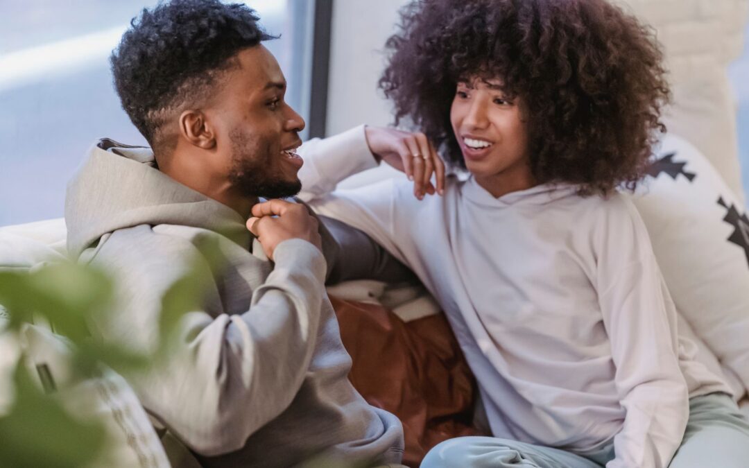 couple smiling and talking